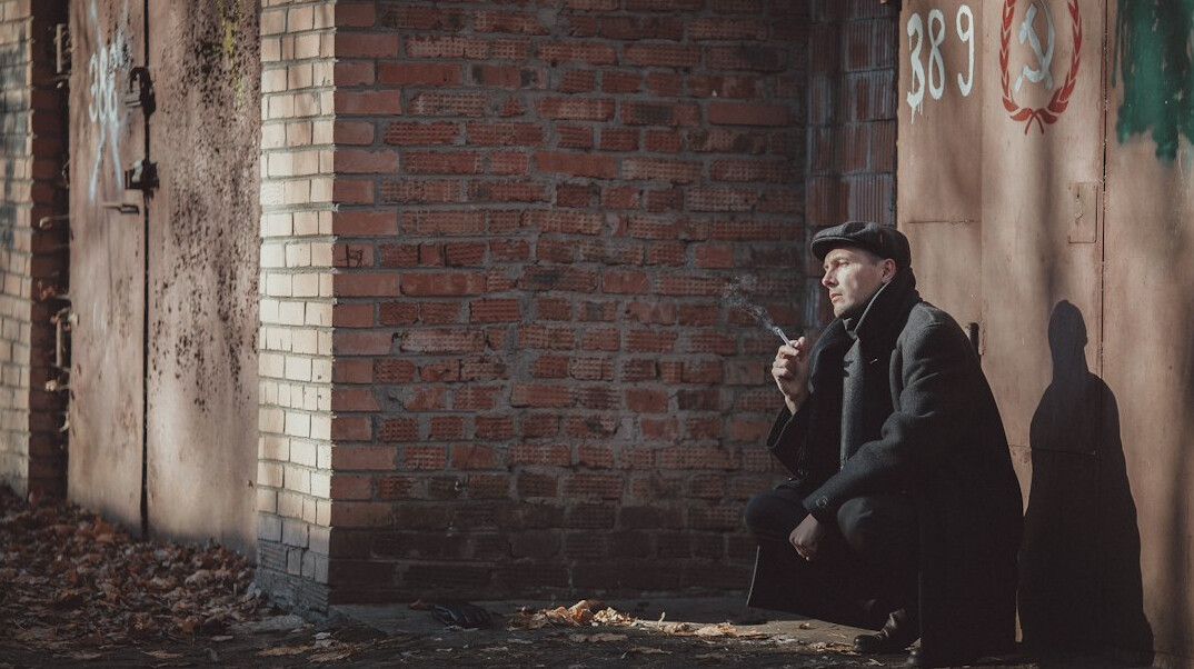 detective talking to suspect