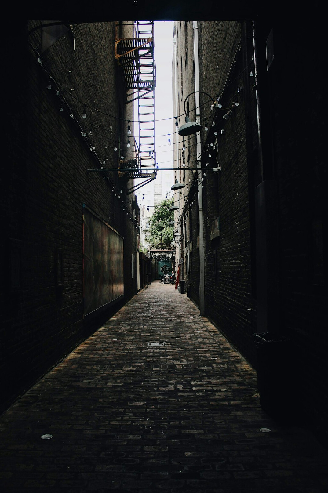 shadowy detective in alley
